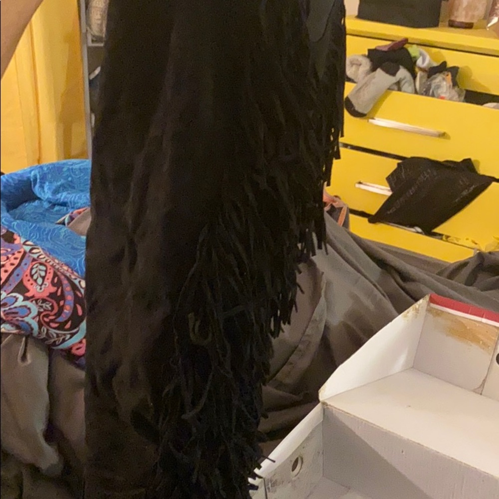 Over the knee fringe boots